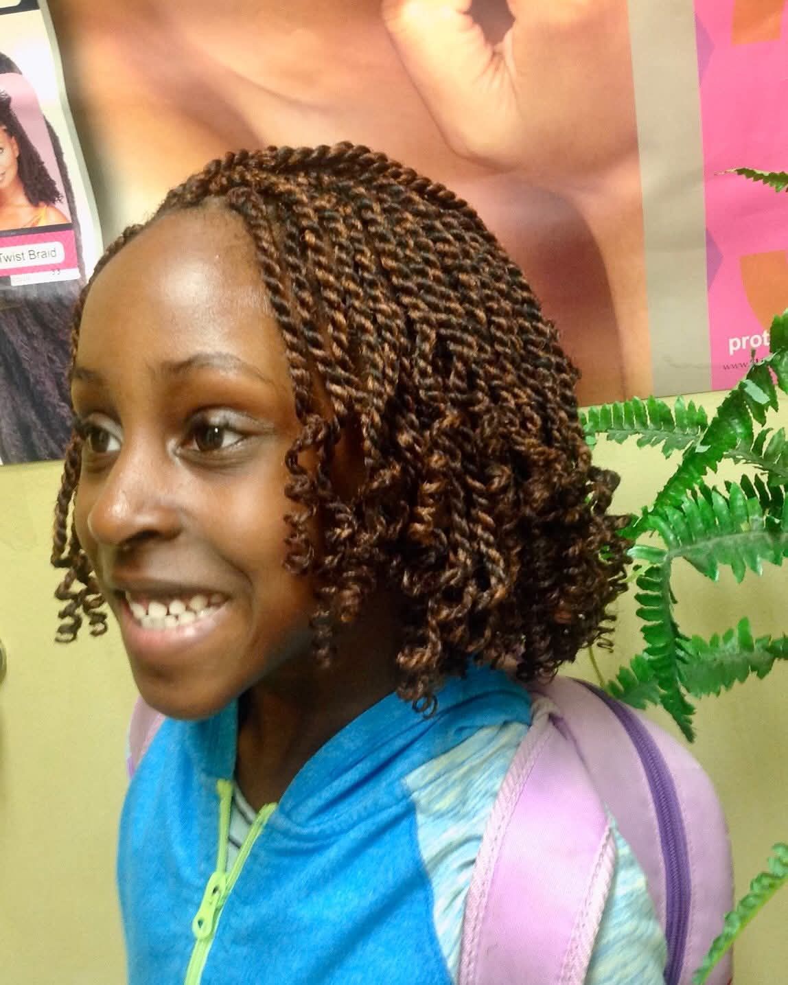 Smiling girl with curly hair