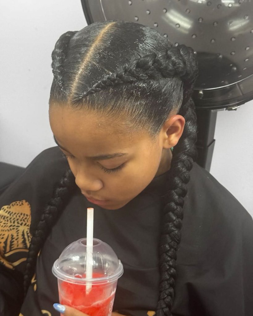 Girl with braids and drink